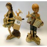 Two Capo De Monte figurines of children playing musical instruments