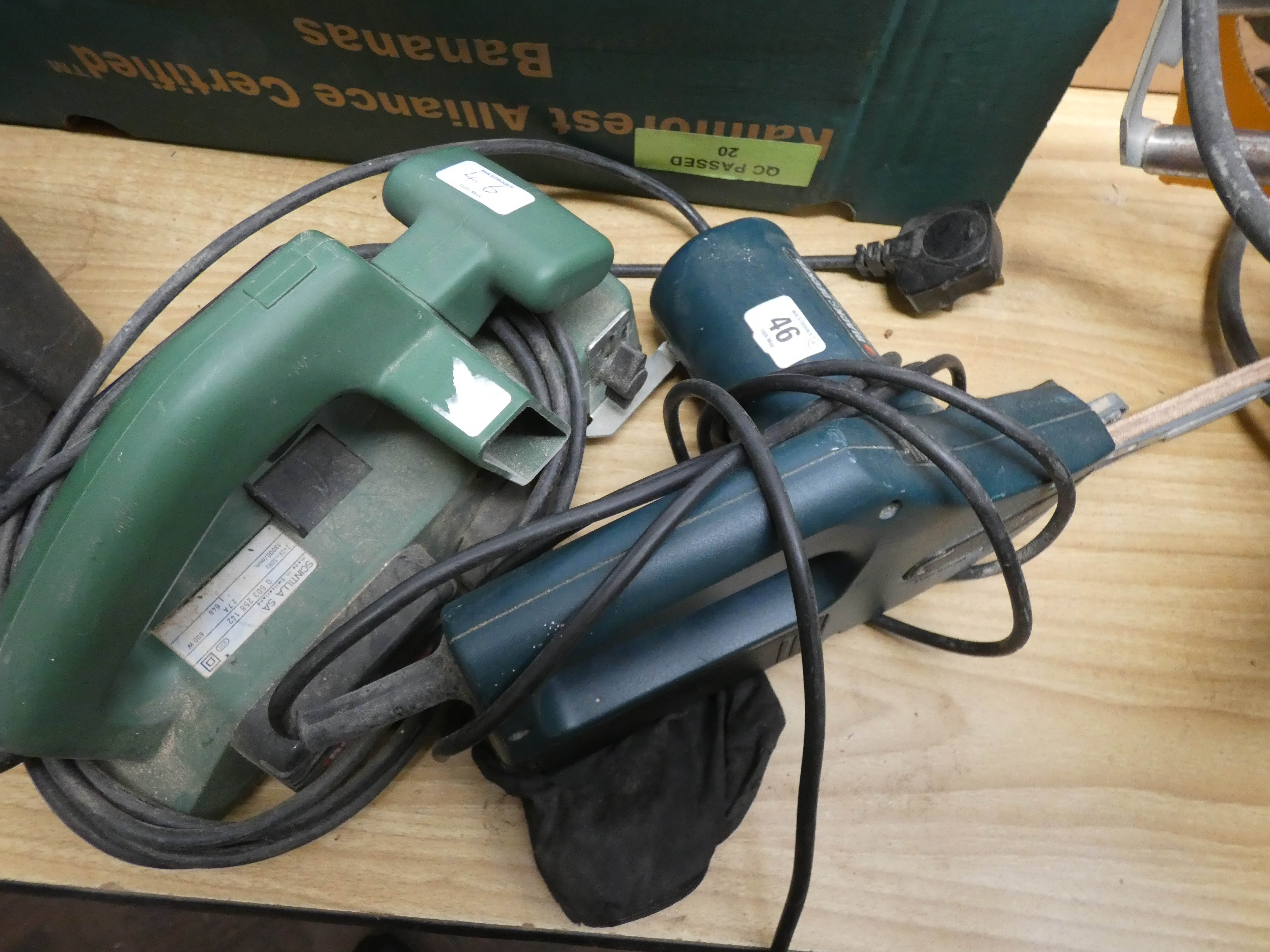 A Black and Decker fine precision sander and a Bosch planer