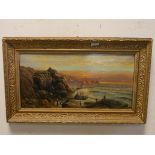 An oil painting of a figure and boats on sea shore in gilt frame signed John James Wilson, 9.