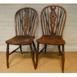 Four period wheel back Windsor dining chairs