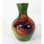 A Moorcroft miniature vase decorated with Hibiscus, impressed Moorcroft to the base,