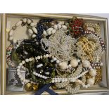 A collection of costume jewellery and beads
