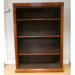 A mahogany open bookcase fitted three adjustable shelves, 42" wide,