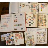 A collection of world stamps contained within approximately six albums