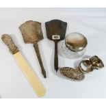 An Edwardian silver and ivory mounted letter opener, two silver backed hand mirrors,