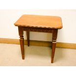 A late 19th century mahogany occasional table on square taper legs