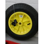 A new wheelbarrow wheel with Numatic tyre and two spacers