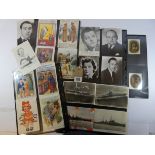 A collection of approximately 31 picture postcards to include film stars, British battleships,