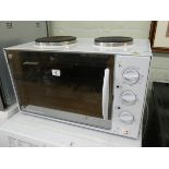 A Russell Hobbs table top grill with two hot plates and mirrored door