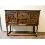 Antique style carved oak side cabinet,