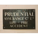A Prudential Insurance company painted copper sign