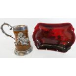 Oak and silver plated mounted trophy tankard and a Doulton flambe dish signed Noke