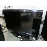 A Sharp 32" digital LCD television with Freeview etc (no remote)