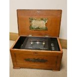 A Victorian musical box playing eight airs and striking on three bells,