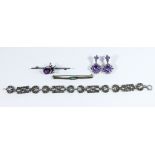 A collection of ladies jewellery to include a marcasite bracelet,