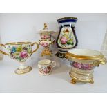 A collection of five pieces of 19th Century porcelain decorated with flowers to include rose bowls,