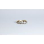 A five stone diamond ring set in 18ct yellow gold, ring size M, weight 2.
