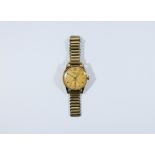 Vintage gentleman's 9ct gold Benson wristwatch, on 9ct gold strap.