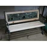 A new metal ended Victorian style young child's garden bench with animal back approx 3' wide