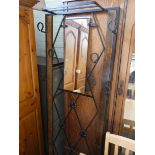 A modern metal framed hall stand fitted with mirror,