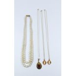 Double row of Ciro pearls with 9ct gold clasp and three pendants on fine 9ct gold chains