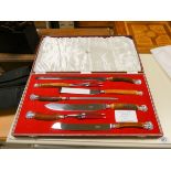 A Harrods seven piece bone handled carving set in case