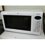 A Panasonic inverter slimline combi microwave oven in white case