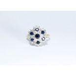 18ct gold sapphire and diamond snowflake cluster ring, ring size Q, weight 7.
