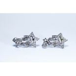 A pair of 18ct white gold and cubic zirconia shooting star earrings to match the previous lot