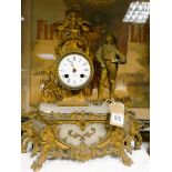 A white marble and gilt figure decorated French striking mantel clock