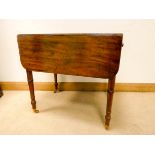 A mid 19th Century mahogany Pembroke table, fitted one drawer on turned legs,