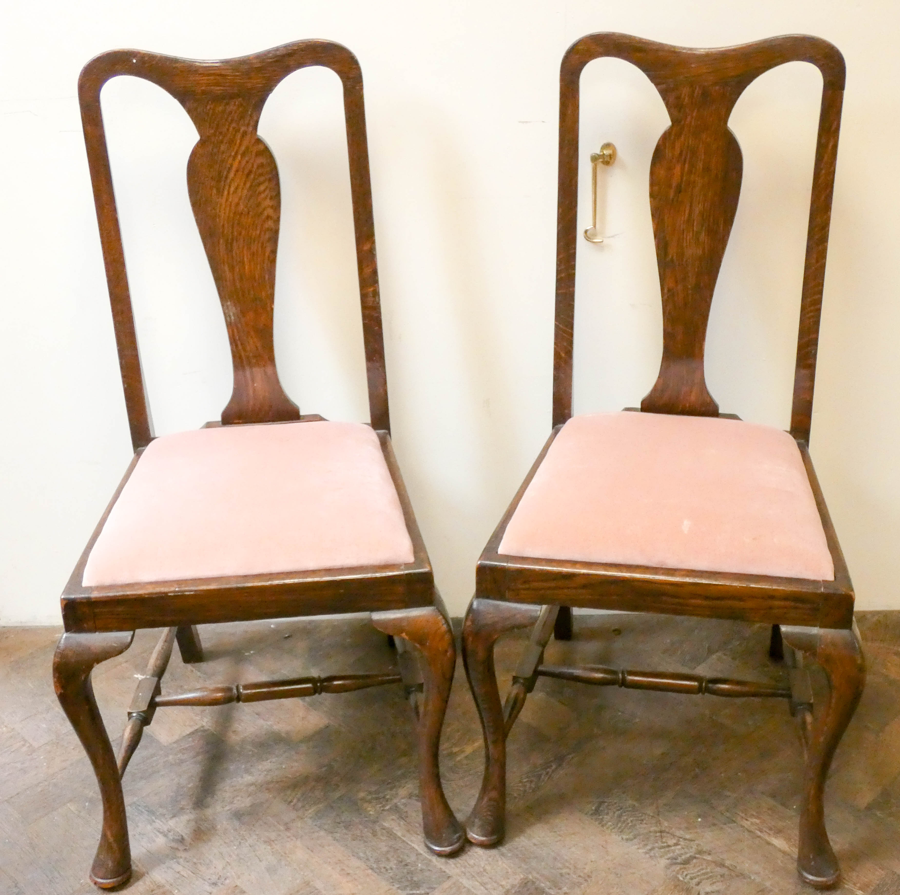 Set of four 1920's oak Queen Anne style dining chairs with pink velvet drop in seats