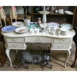 A cream painted kidney shaped dressing table on cabriole style legs (no mirror),