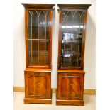A pair of Georgian style mahogany glazed bookcases or display cabinets,