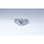 An 18ct white gold and solitaire ring,