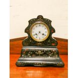 Late Victorian striking mantel clock in ebonised and inlaid style case