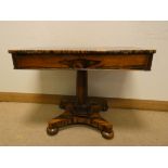 A Victorian figured rosewood centre table fitted one long drawer on pillar and platform base