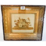 A 19th Century stump work picture of a basket of flowers, set within a box frame,