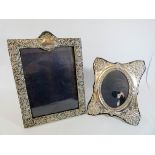 Two hallmarked silver easel photograph frames,