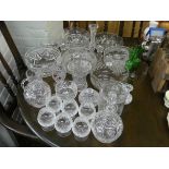 A large quantity of assorted cut and other glassware to include fruit bowls, decanter,