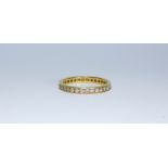 An 18ct yellow gold and diamond full eternity ring, ring size N 1/2, total approximate weight 2.