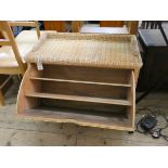 A wicker drop front shoe cabinet