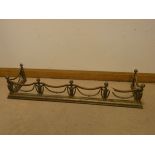 A heavy Victorian brass fire fender,