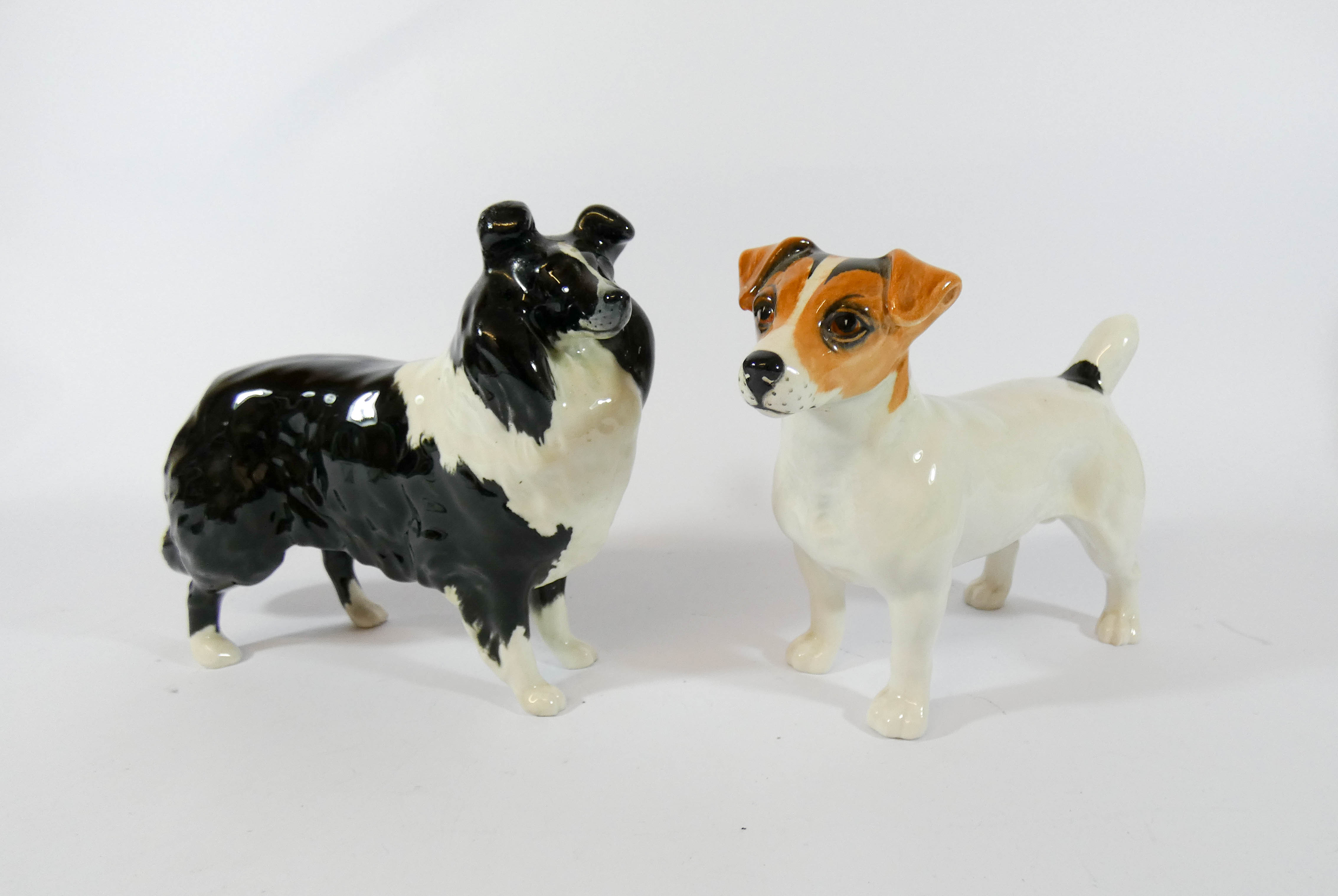 A Beswick model of a Collie dog and a Jack Russell terrier