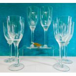 A set of six Lalique crystal Angel champagne flutes with frosted angel heads to the stems and