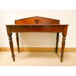 A Victorian mahogany hall table fitted one end drawer on tuned legs with small shaped back,