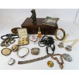 A hardwood box to contain carved treen bear, gilt metal gate bracelet cloisonne and other beads,