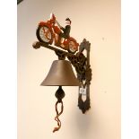 A motorbike shaped cast iron door bell