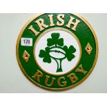 A round cast iron wall hanging Irish Rugby plaque