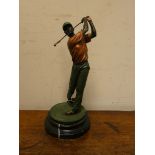 A contemporary painted bronze figure of a golfer on a marble plinth approximately 14" high